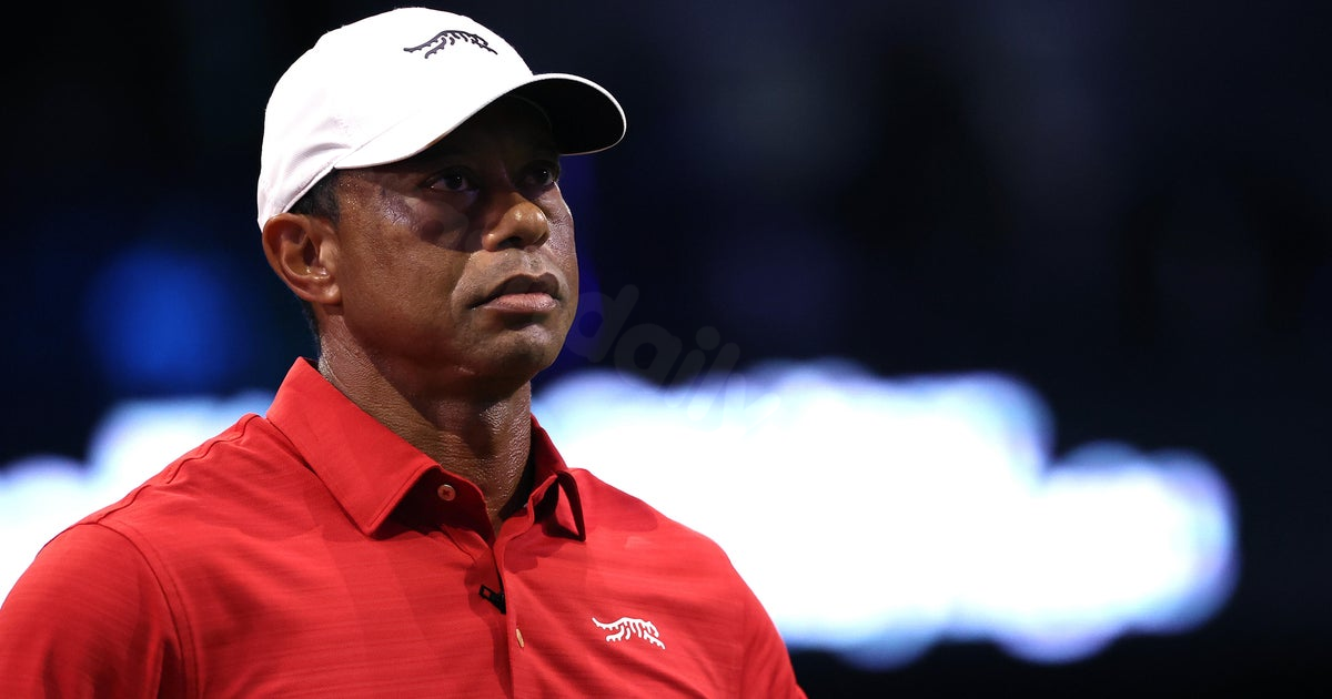 Tiger Woods charged with DUI after rollover crash in Florida, authorities say
