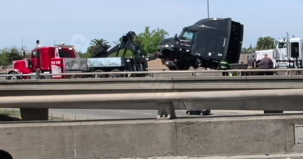 Jackknifed big-rig catches fire, blocks ramp at Business 80, Highway 50 in Sacramento