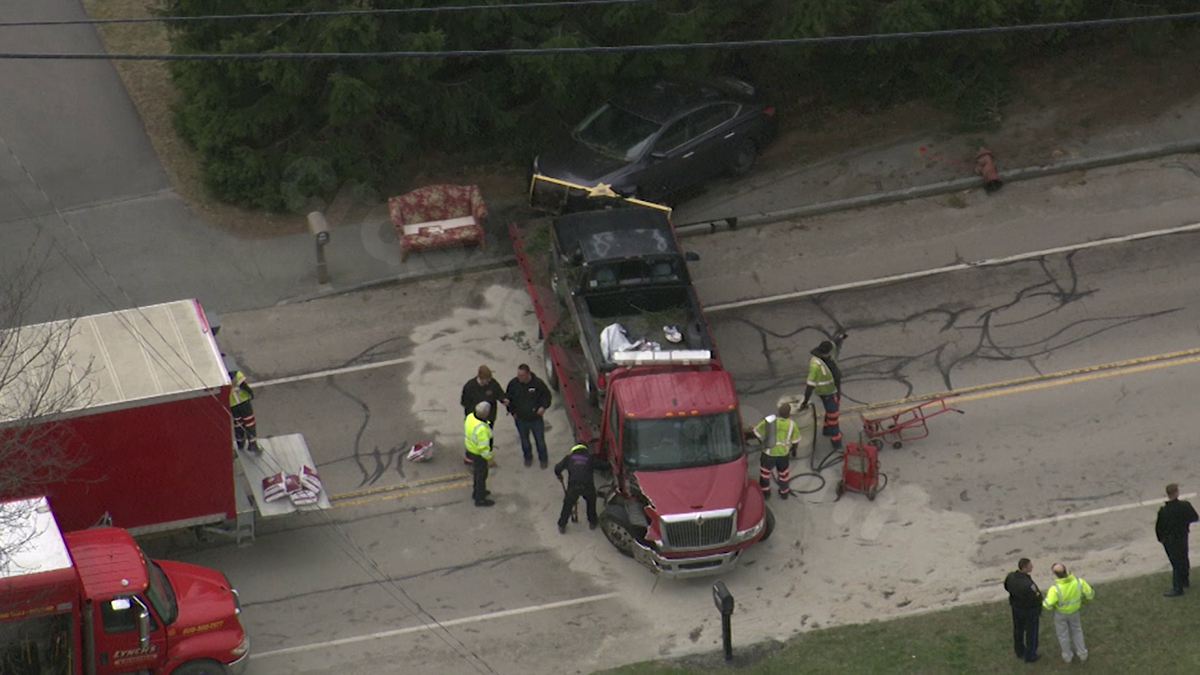 Tow truck crashes into utility poles and hydrant in Bridgewater, knocking out power and water