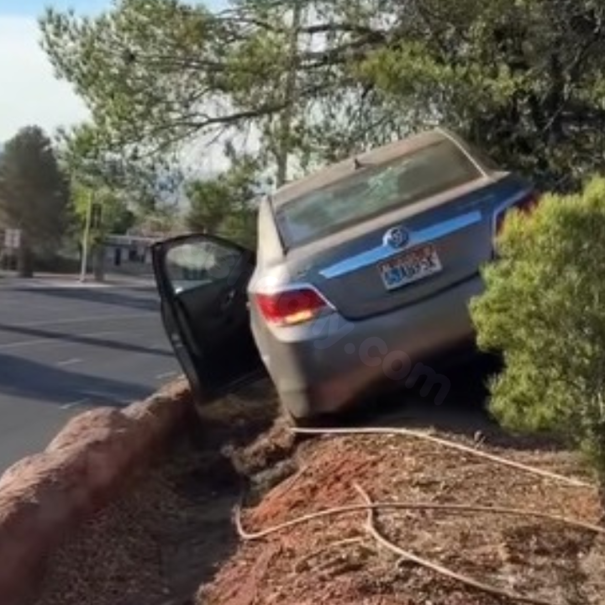 VIDEO: Car dangles off St. George cliff after drunk driving accident