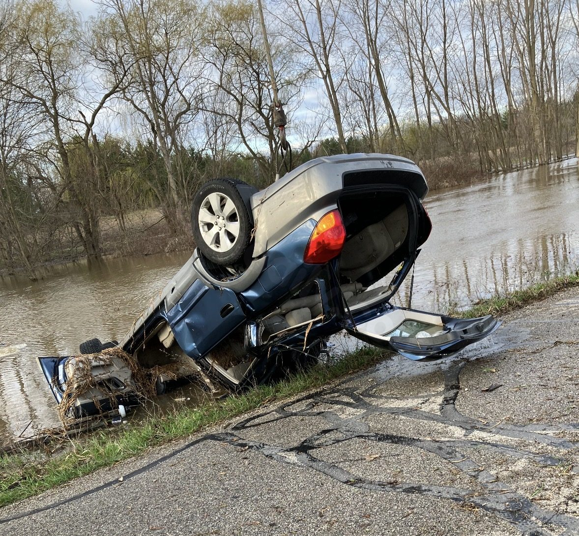 Man dies after vehicle flips, lands in water in DeKalb County