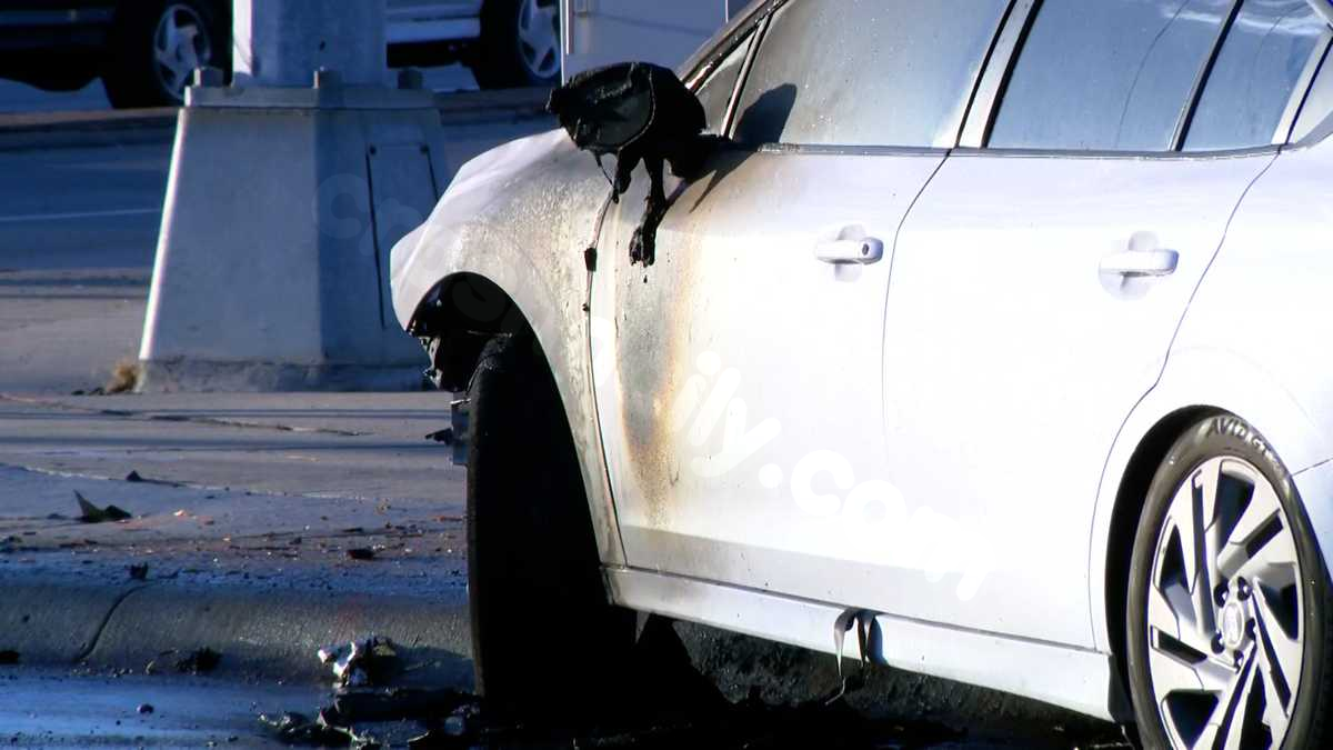A person is critically injured after car crash sparks fire Wednesday morning