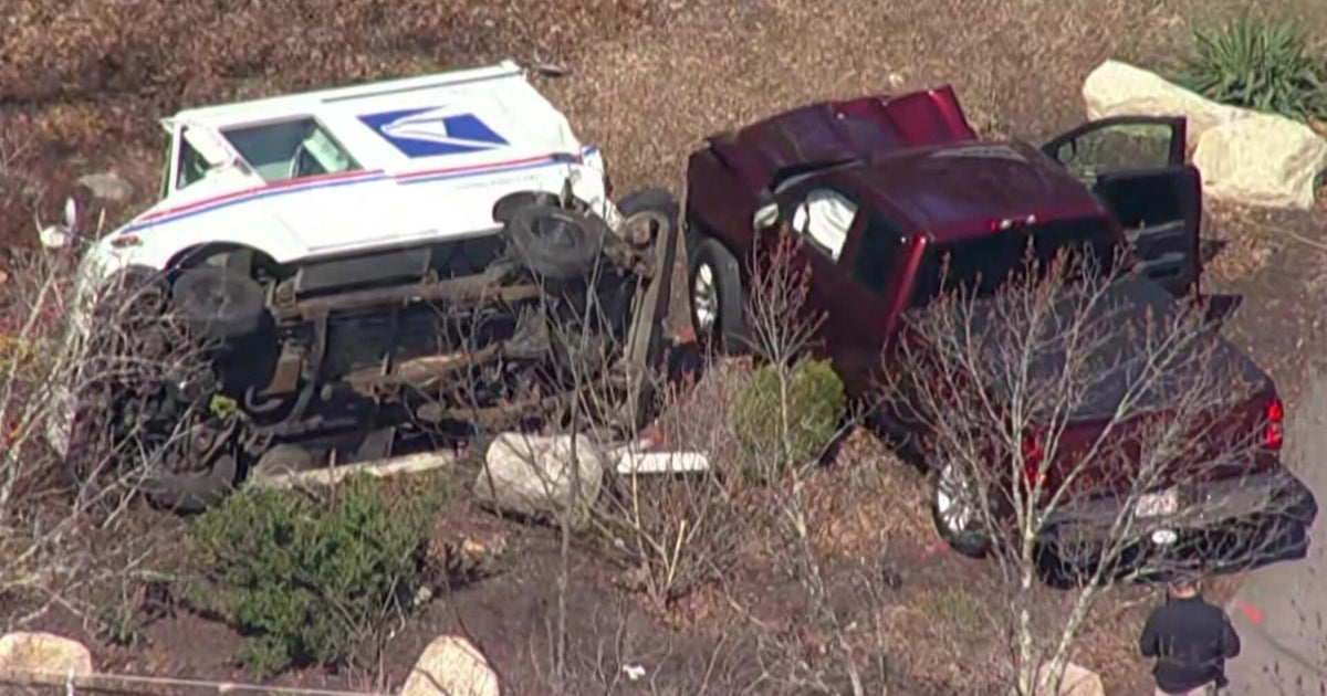 USPS worker pinned under mail truck after Massachusetts crash lucky to be alive, fire chief says