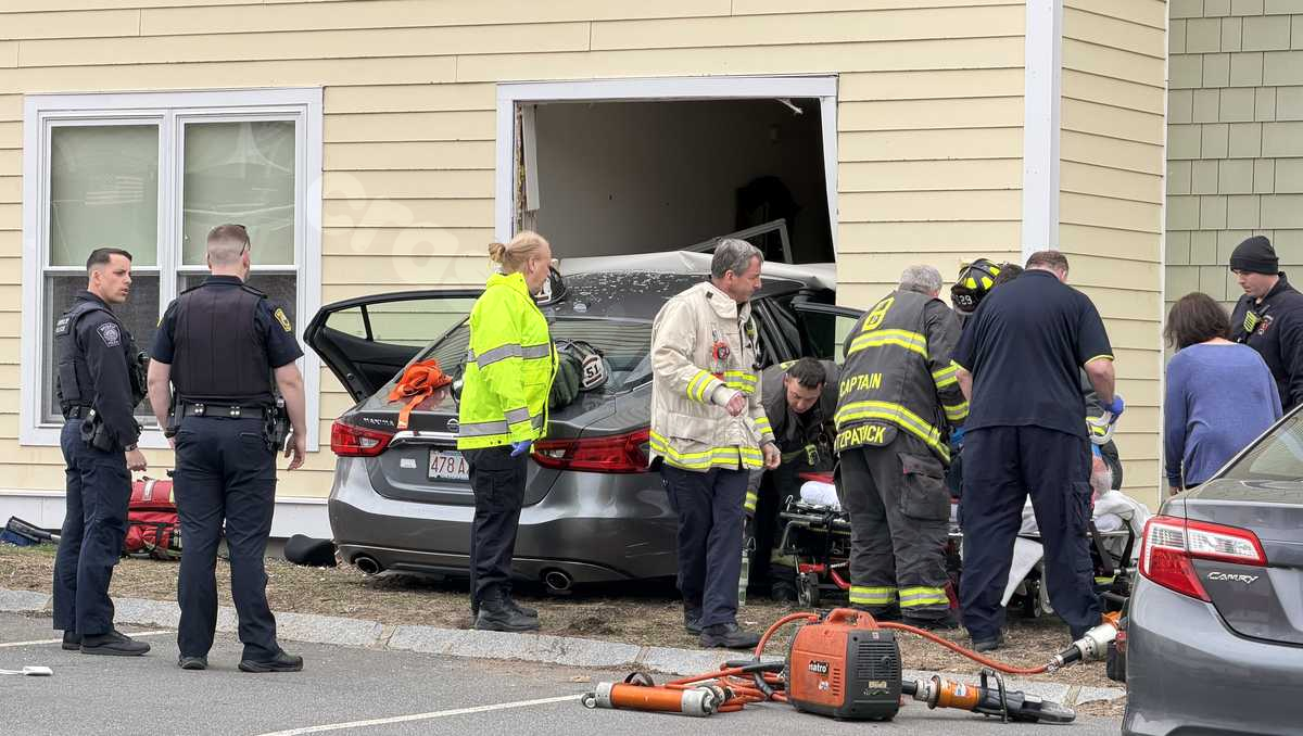 No injuries after car crashes into Beverly, Mass., apartment building