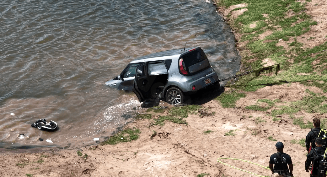 Emergency crews respond to car collision involving submerged vehicle in SE OKC