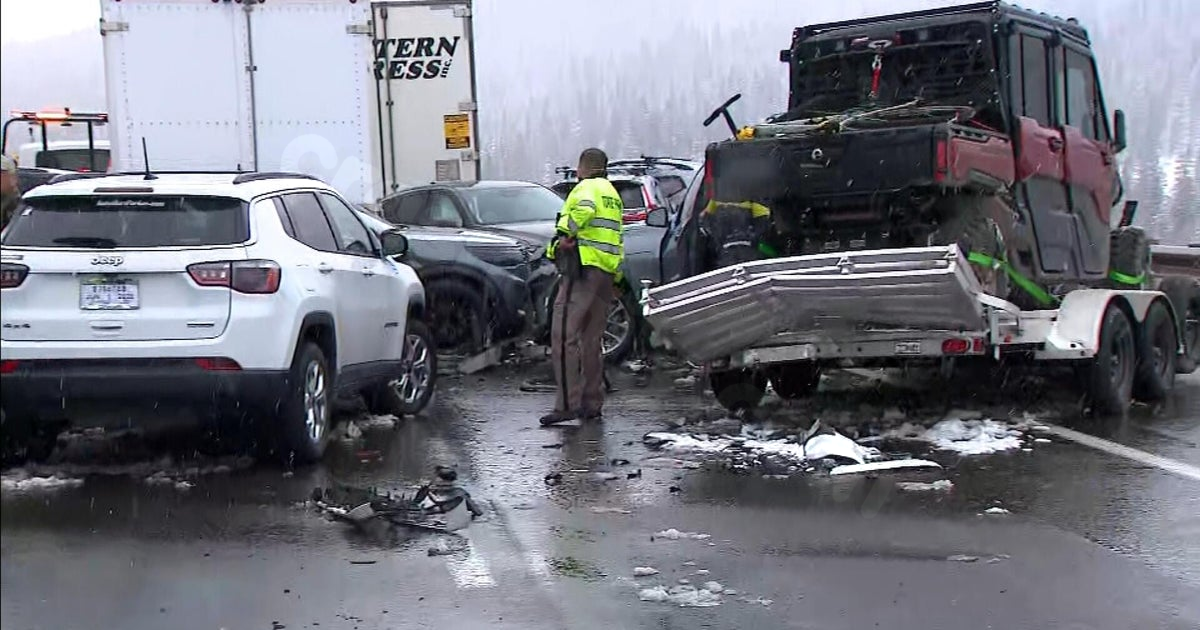 Drivers describe snowy 70-vehicle pileup on Colorado's I-70: "Terrifying watching semis jackknife behind you"