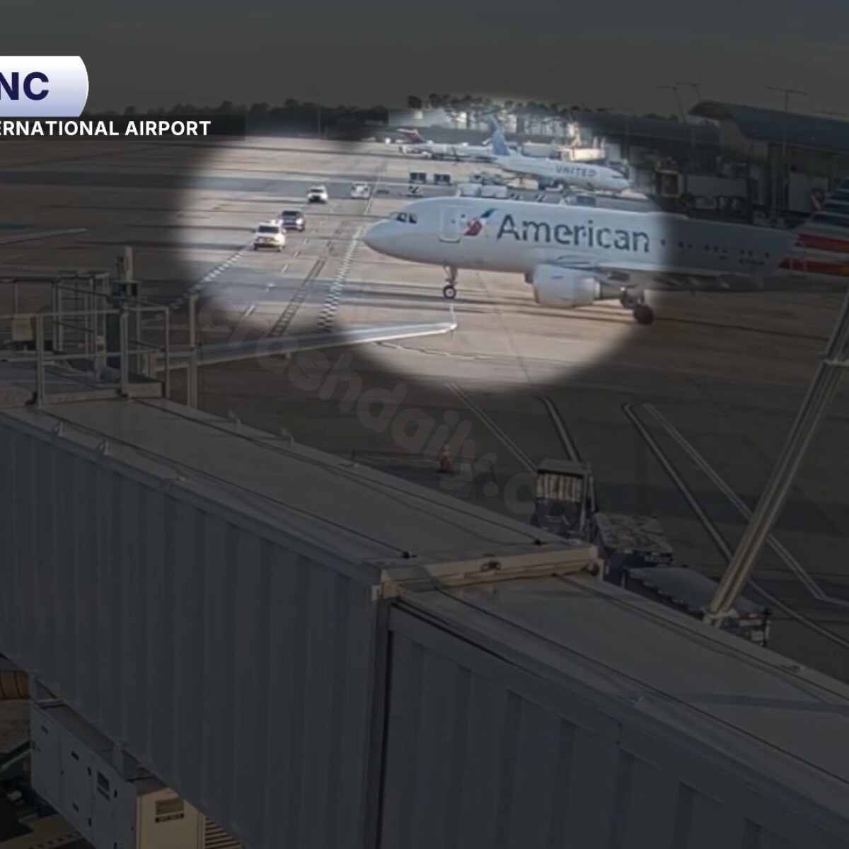 Plane and truck avoid collision in a close call at a North Carolina airport