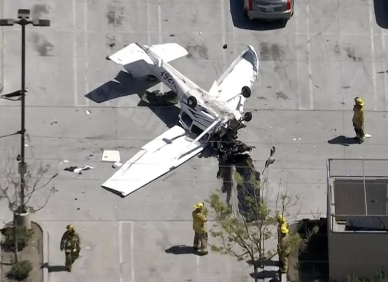 Plane crashes upside down in SoCal auto store parking lot, pilot hospitalized