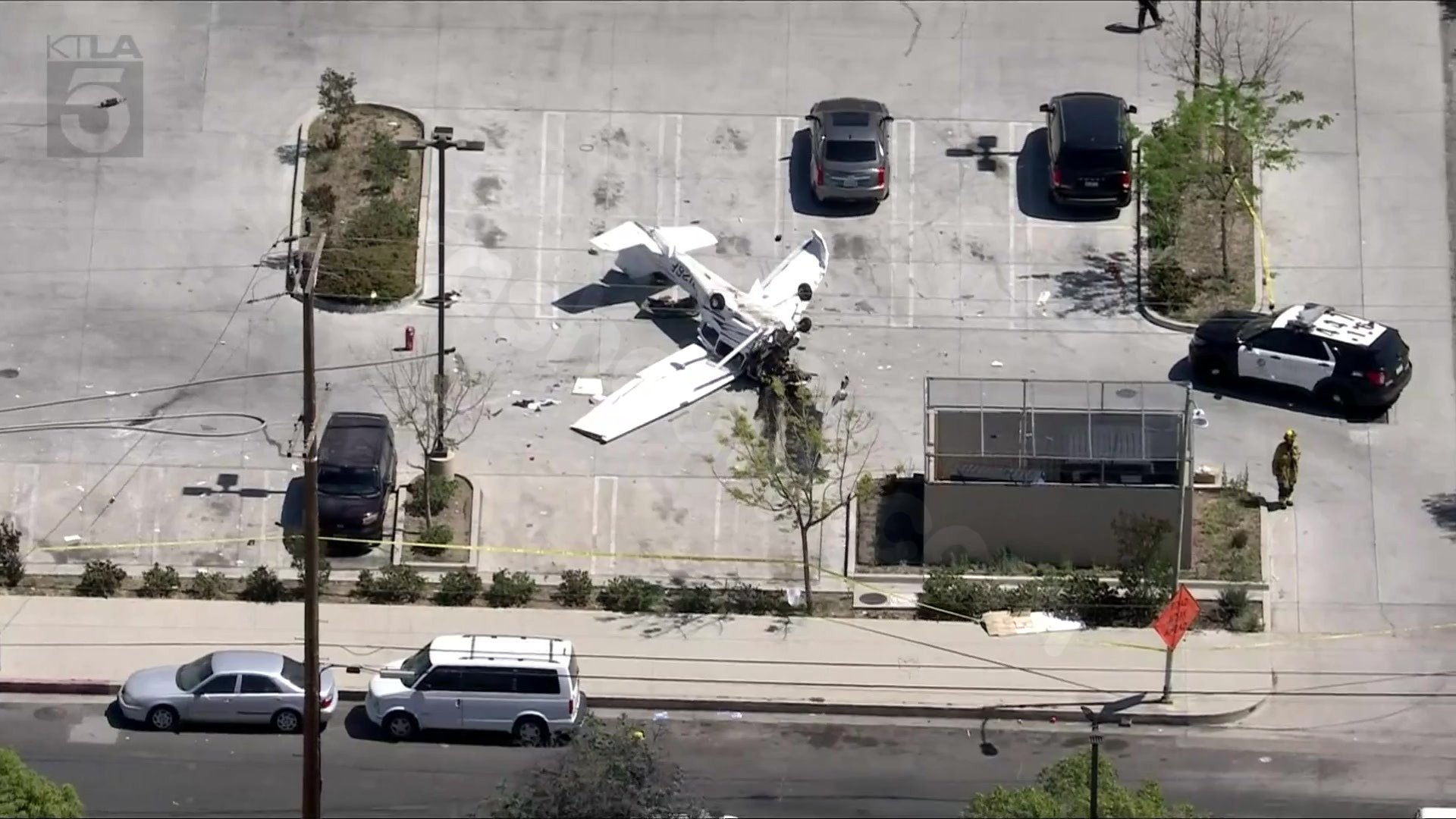 Small plane crashes into Pacoima parking lot; pilot hospitalized