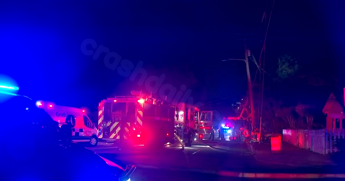 Two hospitalized after car crashes into power pole, bursts into flames in southeast Atlanta