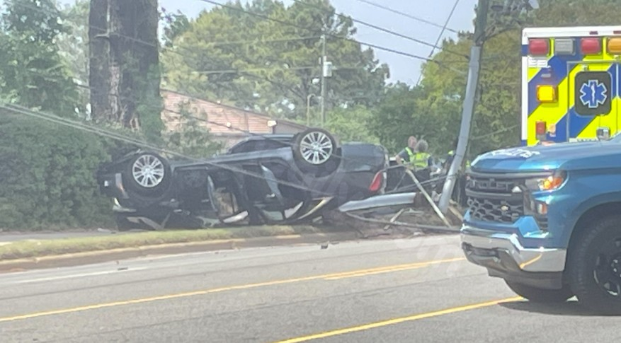 Woman injured after car flips in Raleigh crash; Atlantic Avenue closed with lines, pole down