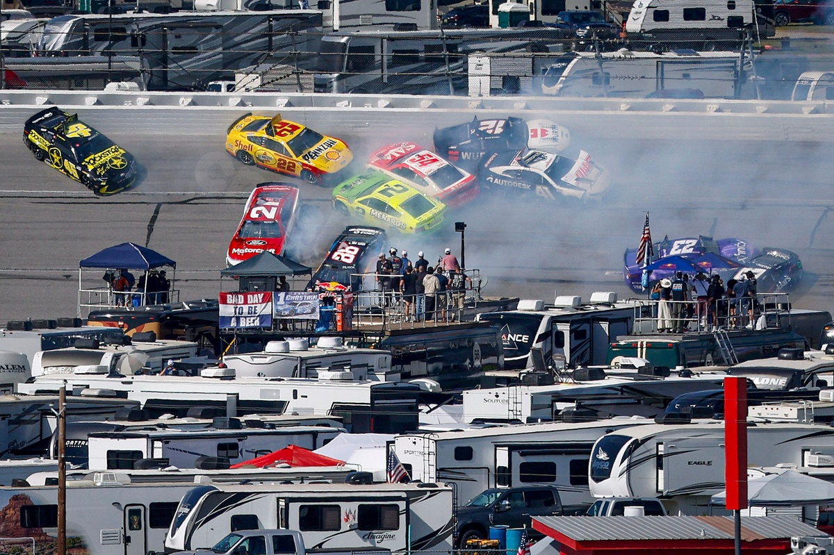 At least 25 cars wreck in massive crash, stopping Talladega Cup race