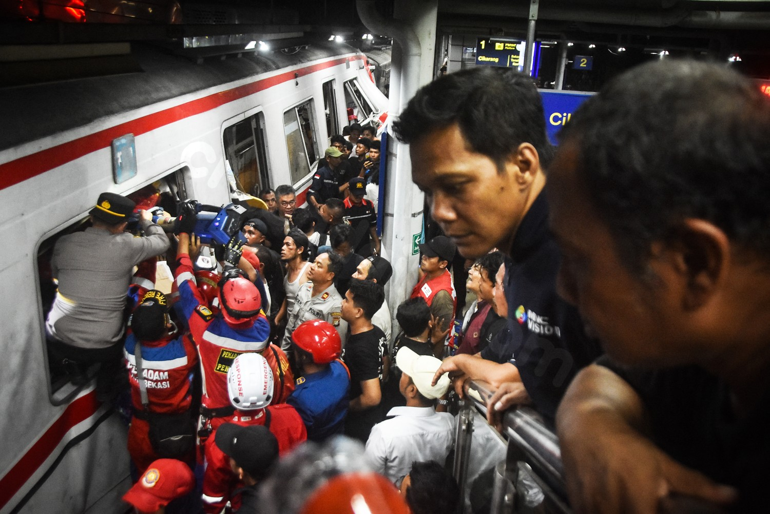 Rescuers recover last victims from Indonesia train wreck that killed 14 and injured dozens