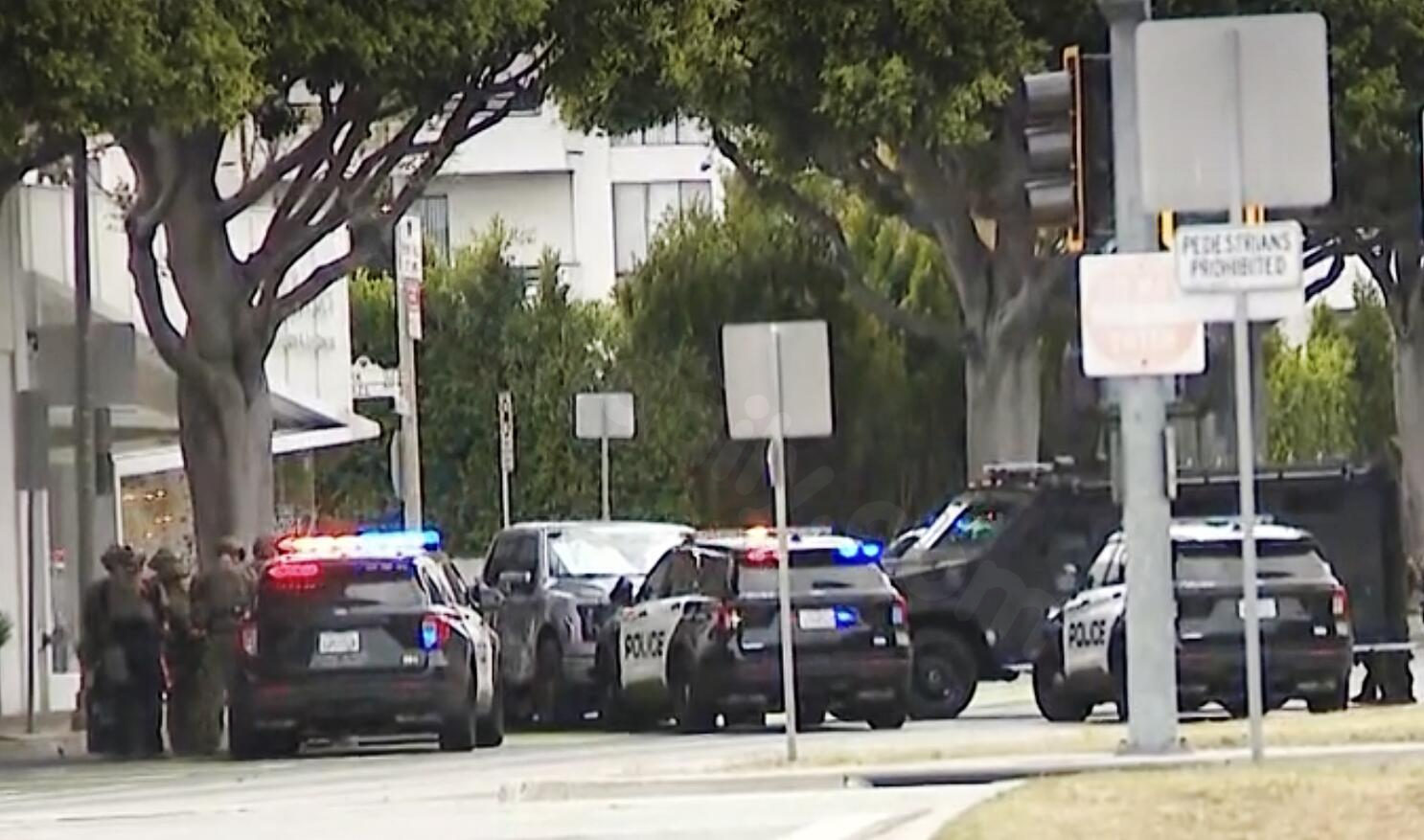 Armed man barricaded inside a vehicle after Beverly Hills police pursuit; hostage released