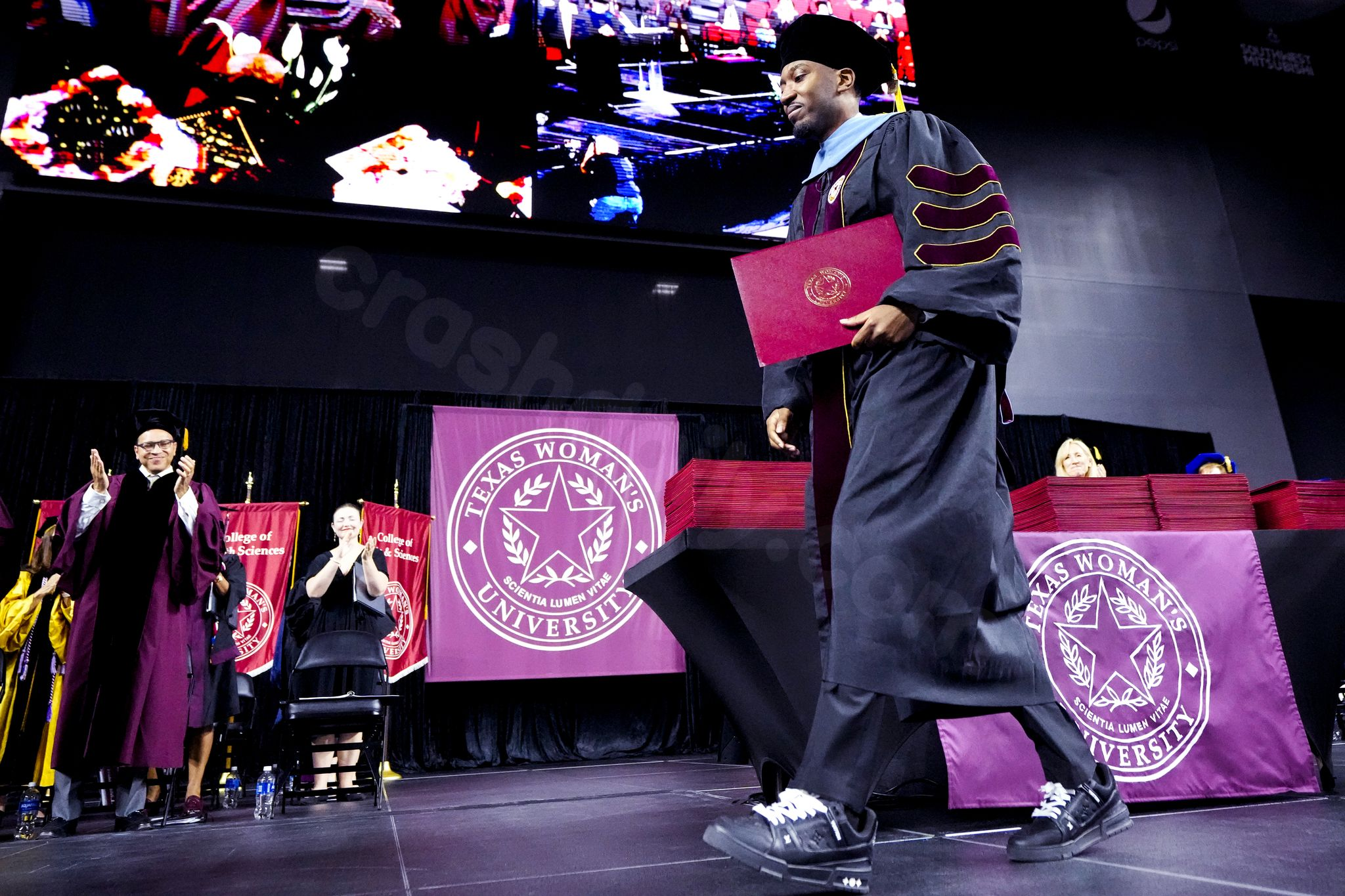 Houston graduate overcomes devastating collision to walk the stage as a doctor