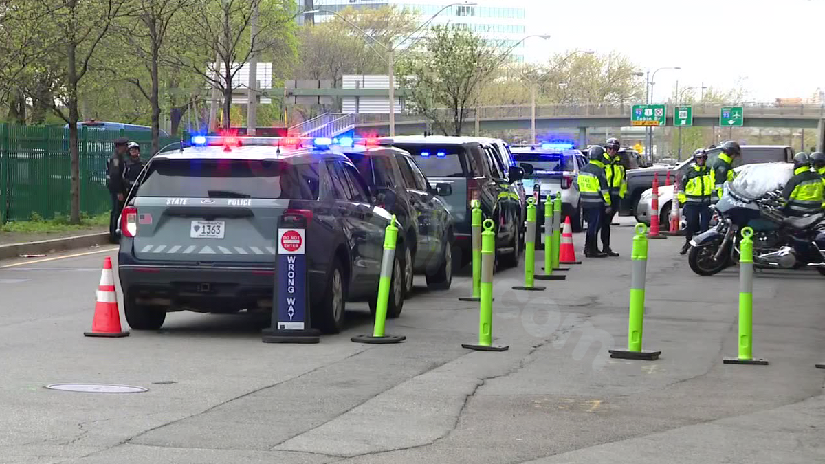 Police gather outside hospital following trooper's death from injuries sustained in Route 1 crash
