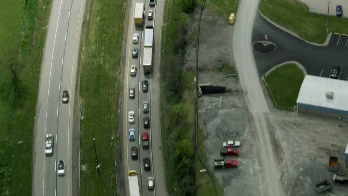 Driver dies after vehicle crosses median on I-70 in Washington, hits tractor-trailer
