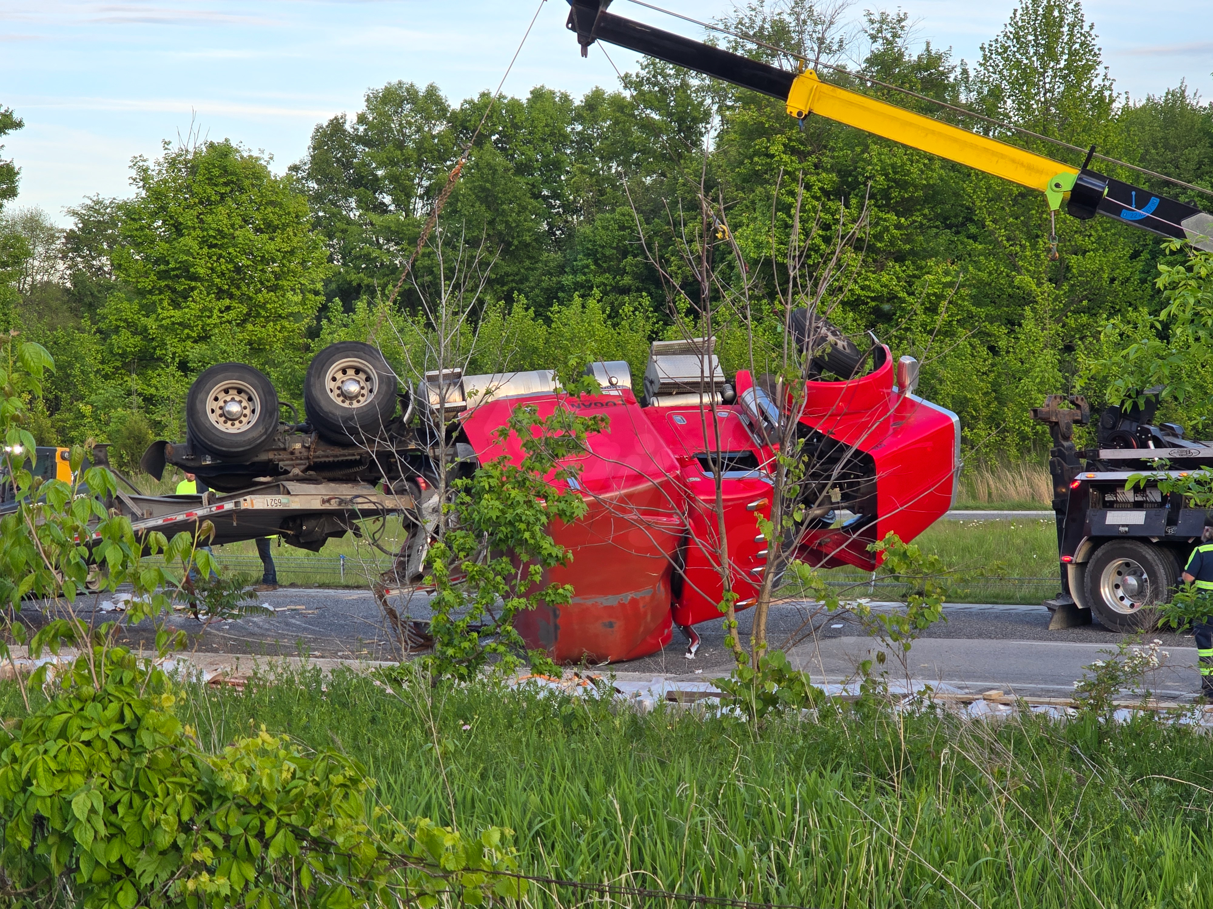 Truck driver says pothole caused I-70 rollover accident
