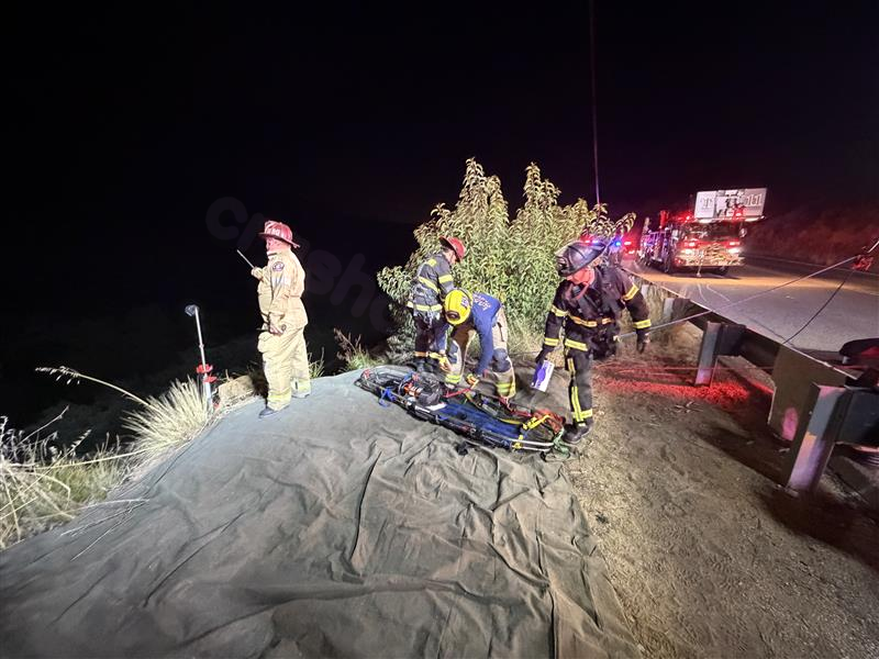 One dead after vehicle plunges down embankment, catches fire in East County