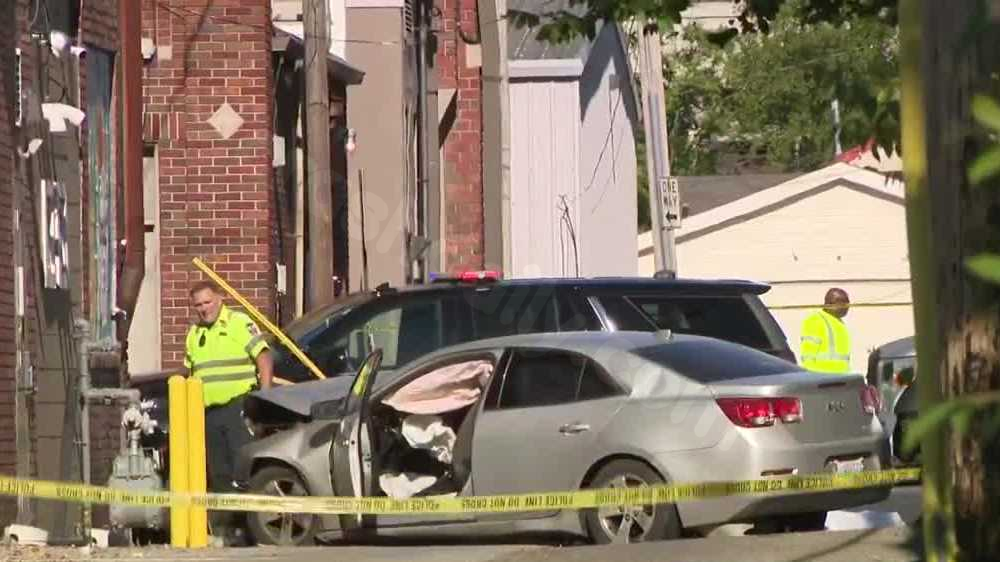 Coroner identifies 19-year-old woman who died after car crashed into Logan Street building