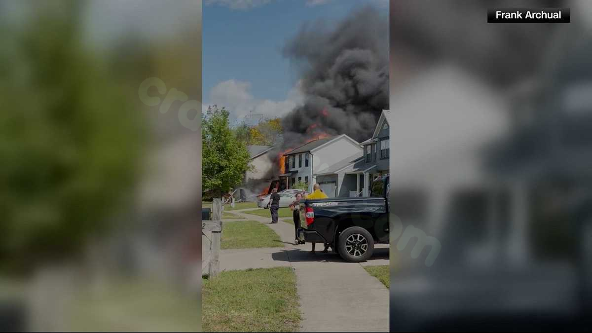 Two killed when small plane crashes into Ohio home and erupts in flames