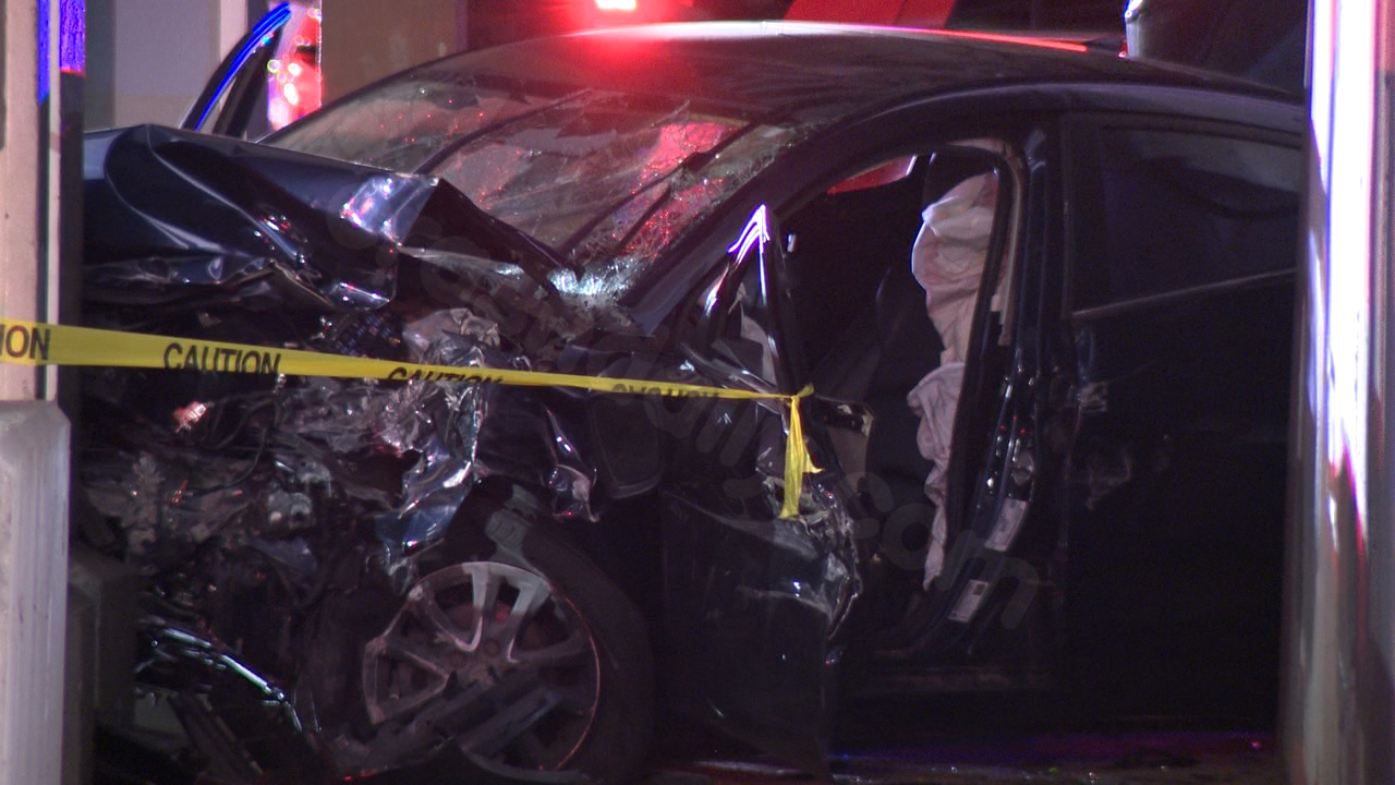 Car crashes into railroad bridge supports during chase in Cleveland