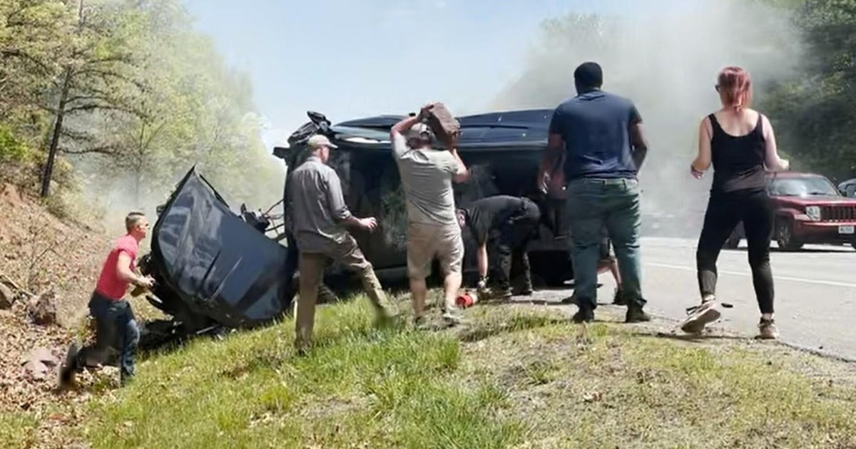 Video shows Good Samaritans rushing to pull 2 people from car following rollover Massachusetts crash