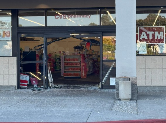 Stolen car crashes into Auburn CVS, suspect flees