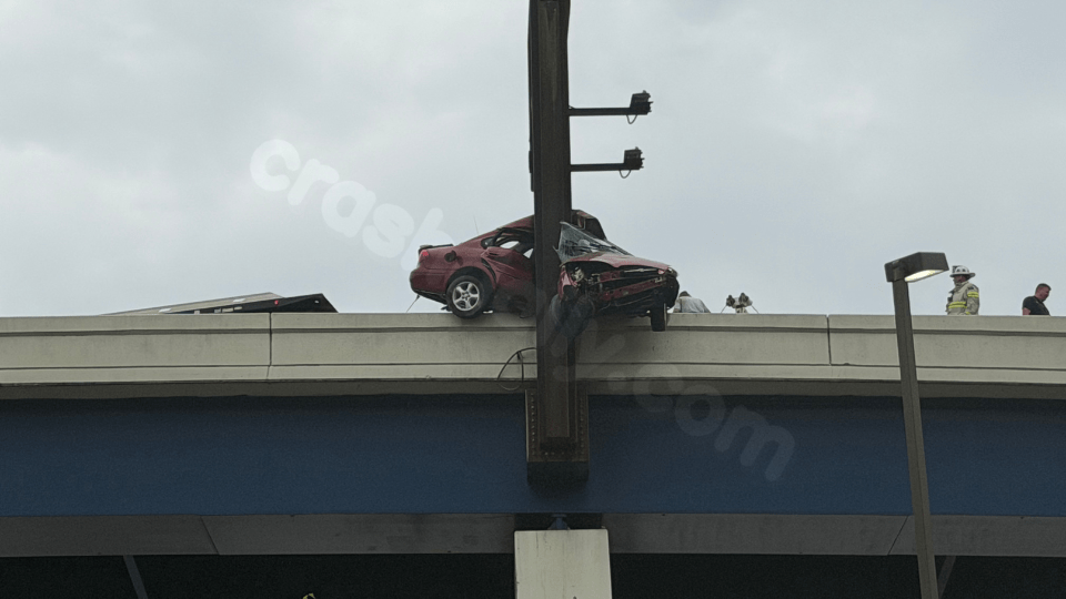 Police: Driver ‘fine’ after crash sends car hanging off side of interstate in Charleston