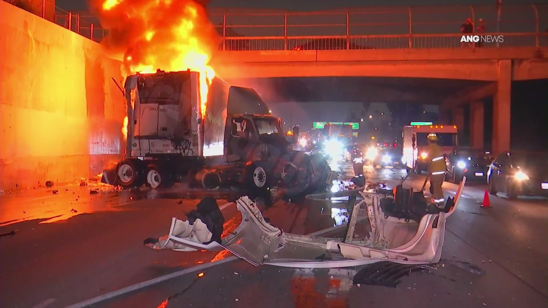VIDEO: Semi-truck engulfed in flames after violent freeway crash in Los Angeles