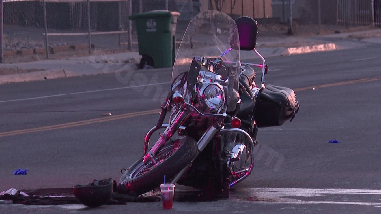 Motorcyclist hospitalized after being hit by a car