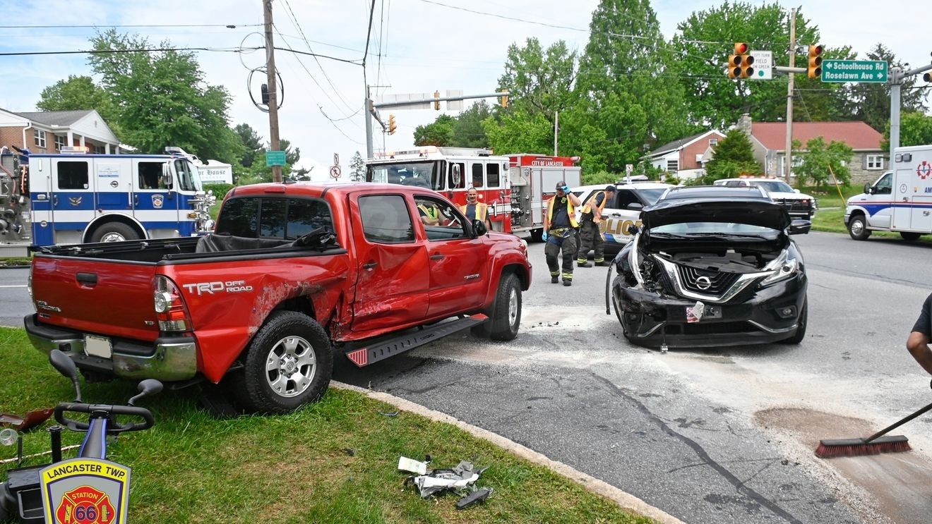 PHOTOS | 2 hospitalized after accident where 1 person was trapped in Lancaster Township