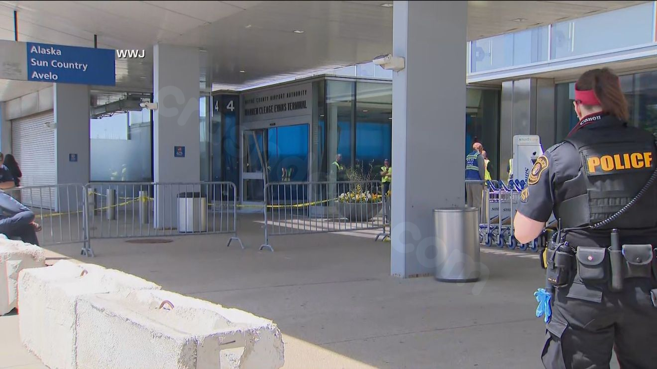 Car crashes into airport terminal in Detroit
