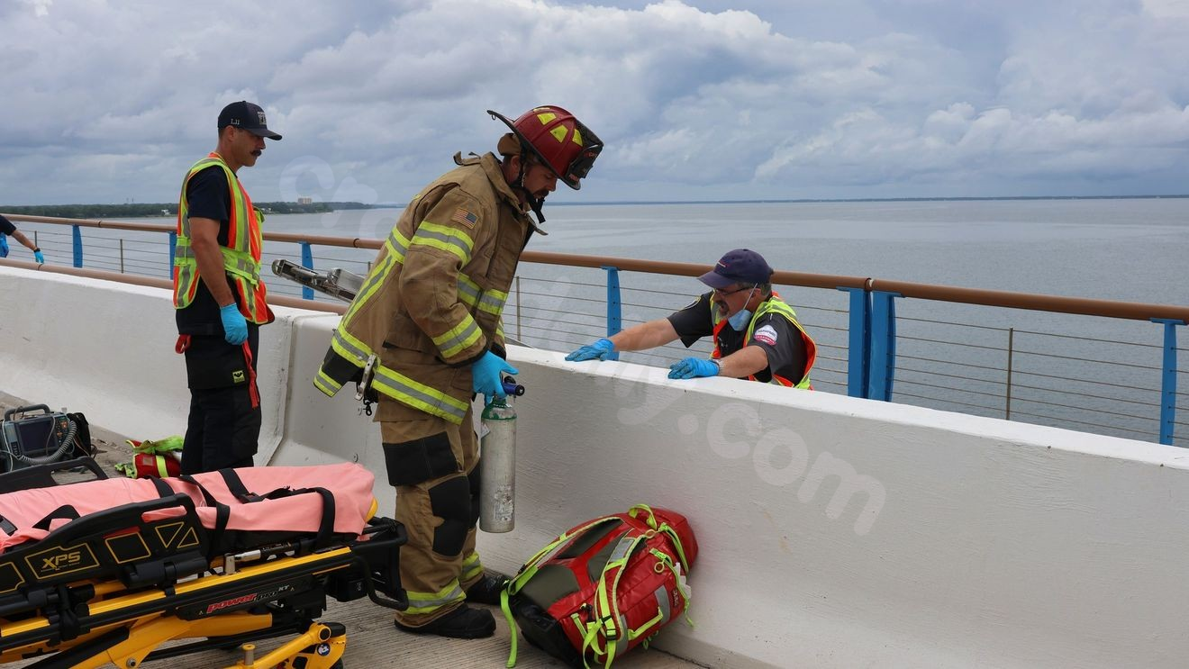 Motorcyclist hospitalized after crash on Three Mile Bridge, fall to pedestrian path