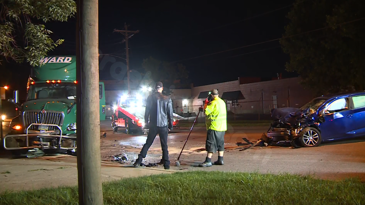 Police: 1 hurt after car crashes into semi in Spring Grove Village