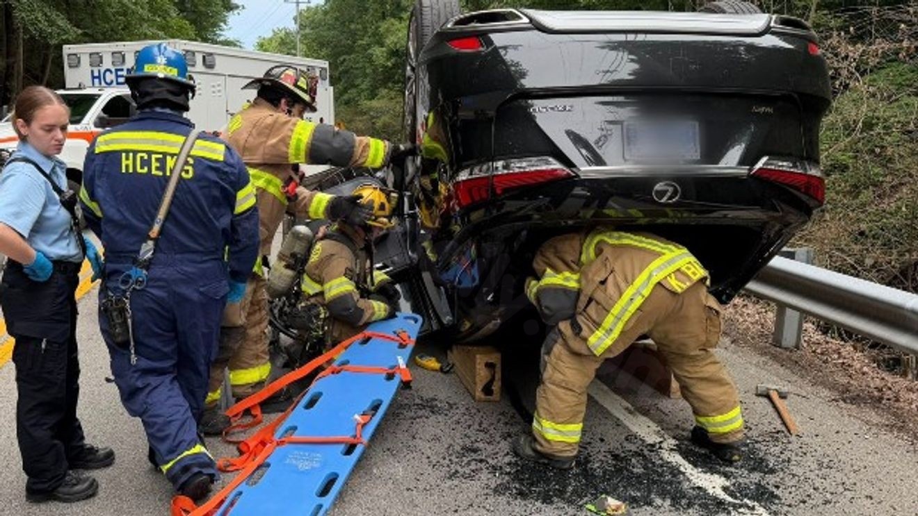 Signal Mountain firefighters free trapped driver after two-vehicle crash overturns car