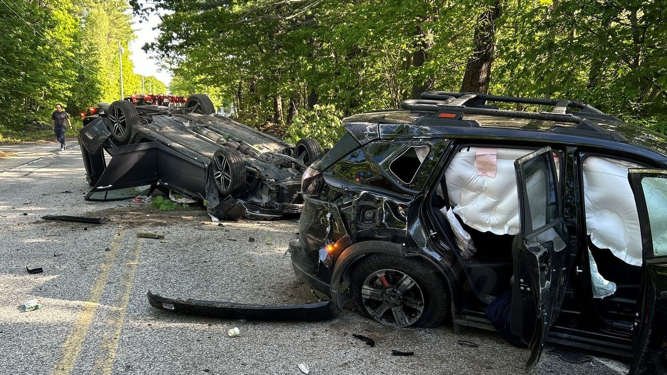 Two vehicles collide while passing line of traffic in Raymond