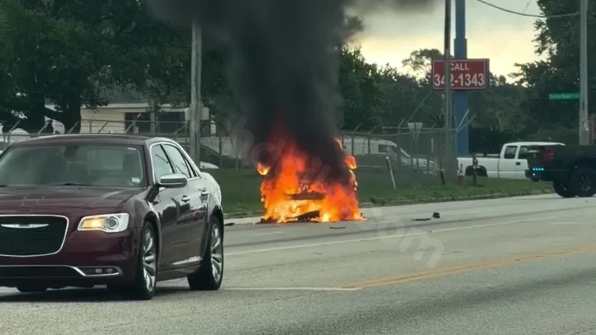 WATCH: Car burns after crash in Mobile