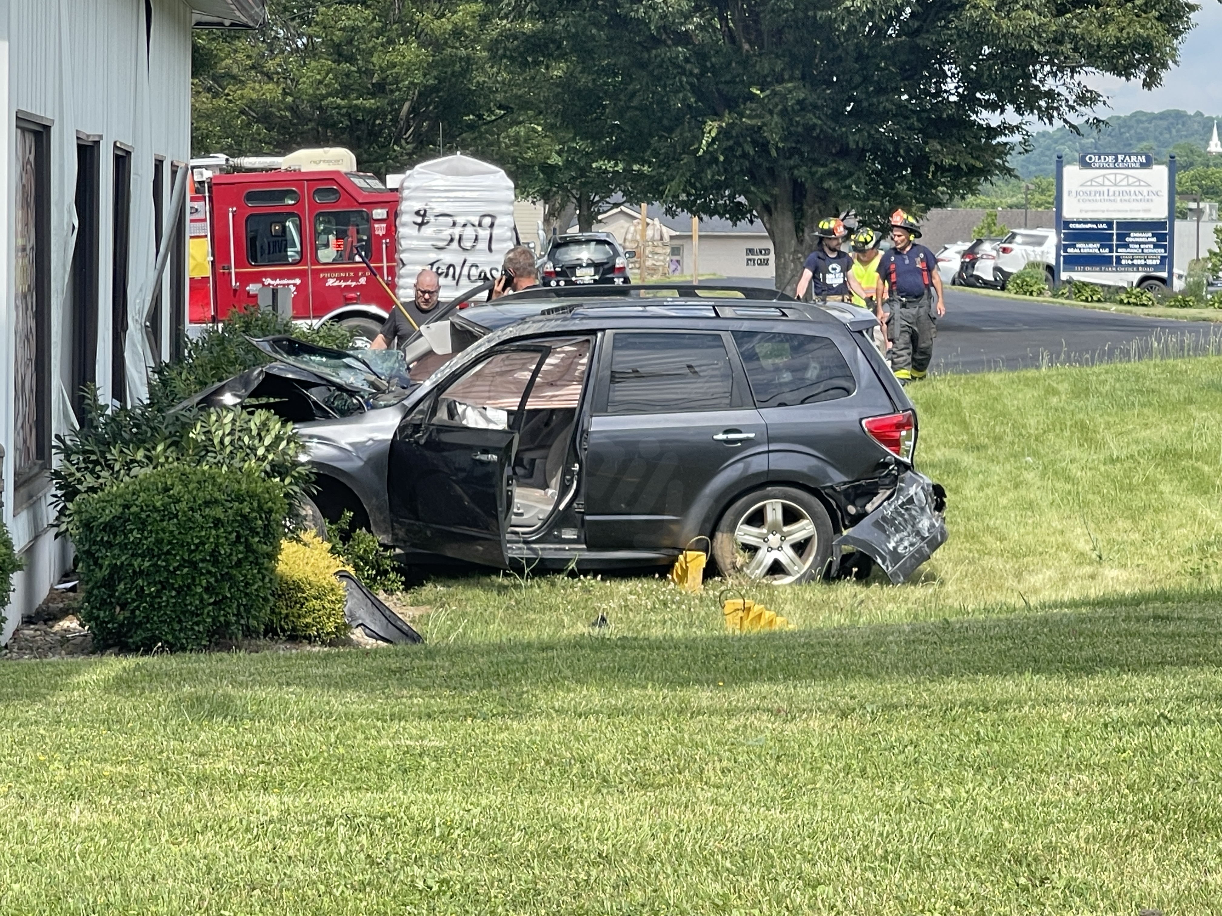 One taken to hospital after car crash into Blair County business