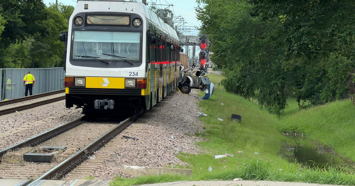 Driver killed after car struck by DART Blue Line train in northeast Dallas, authorities say