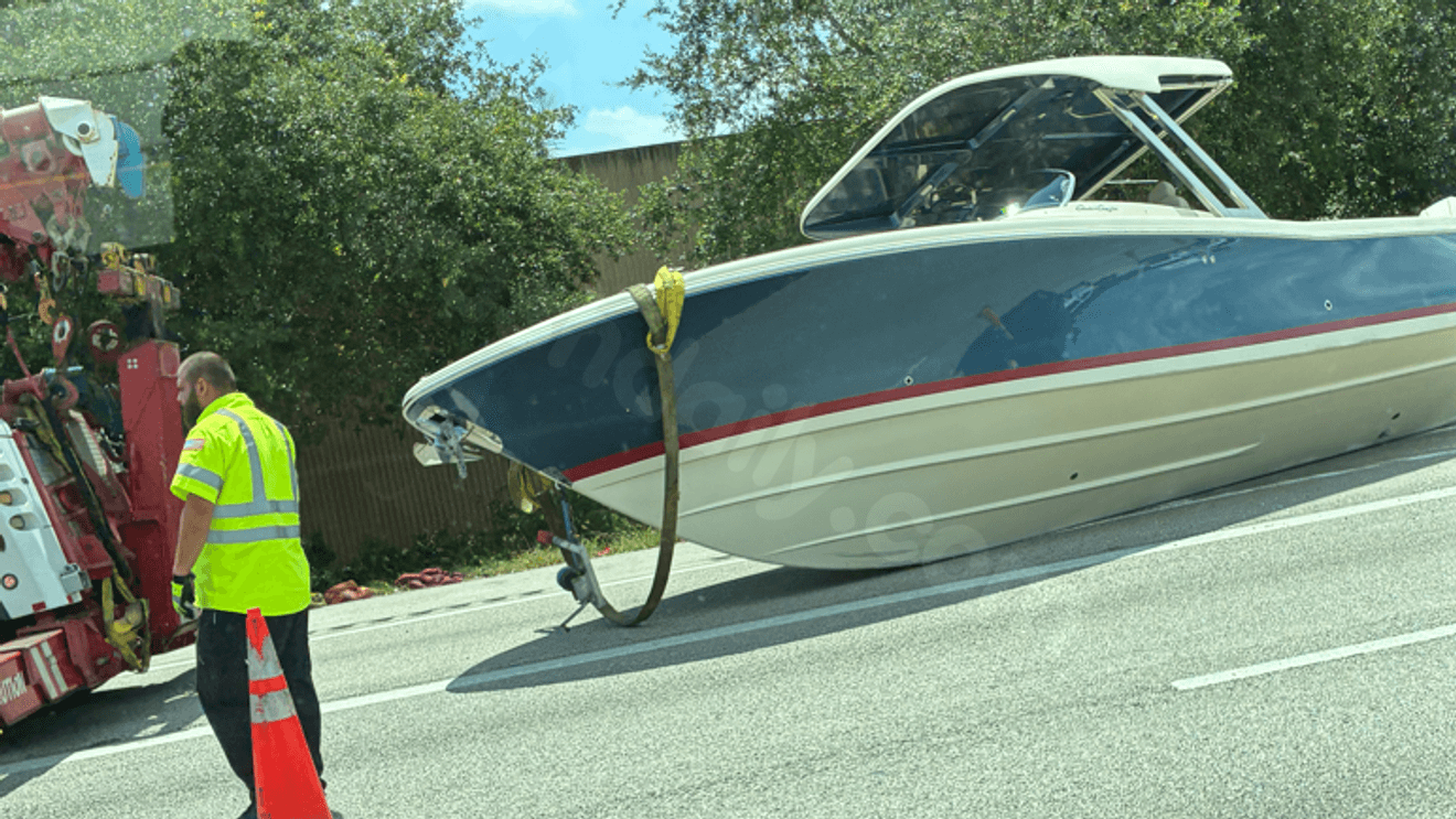 Fishing boat ends up on northbound I-95 after crash near Lantana Exit