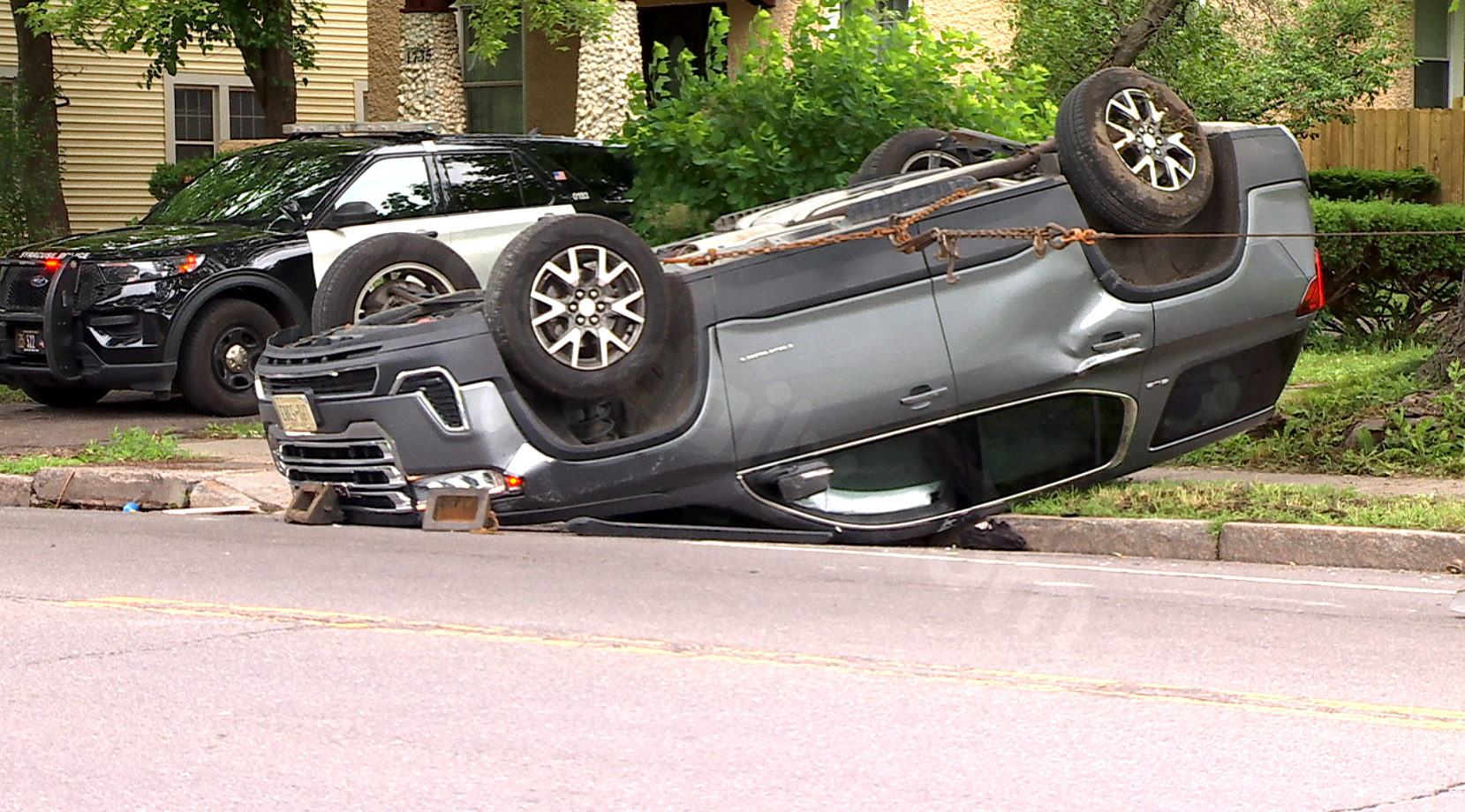 Police: Syracuse man arrested after crashing into and flipping over vehicle, fleeing officers in foot chase
