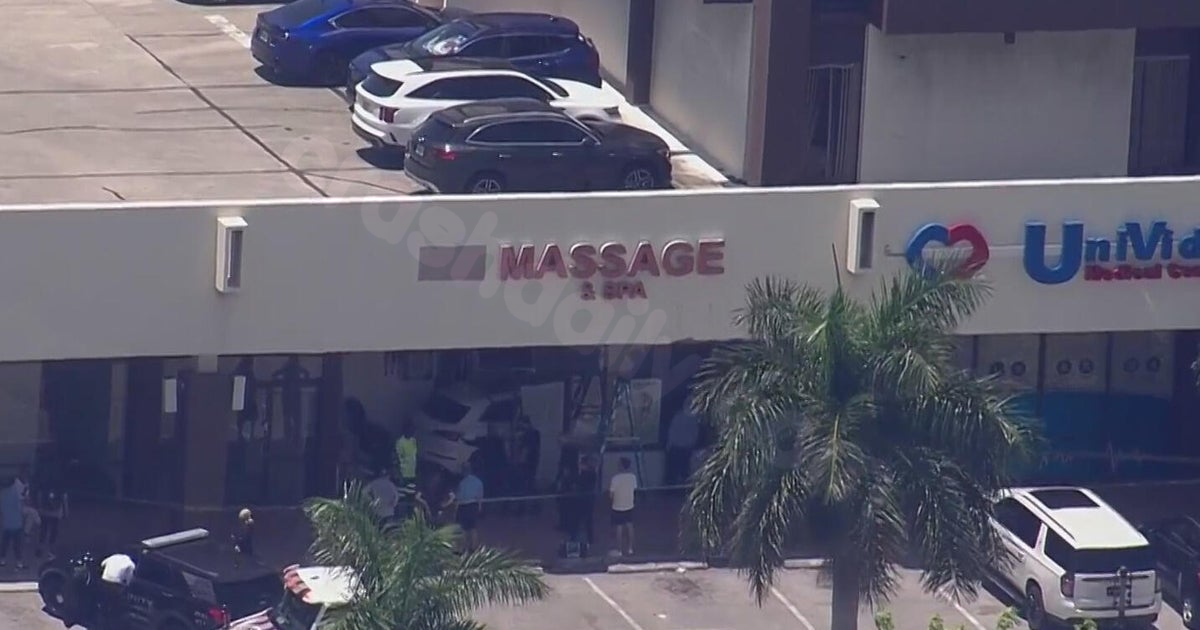 South Florida massage business damaged after car crashes through front of building, officials say