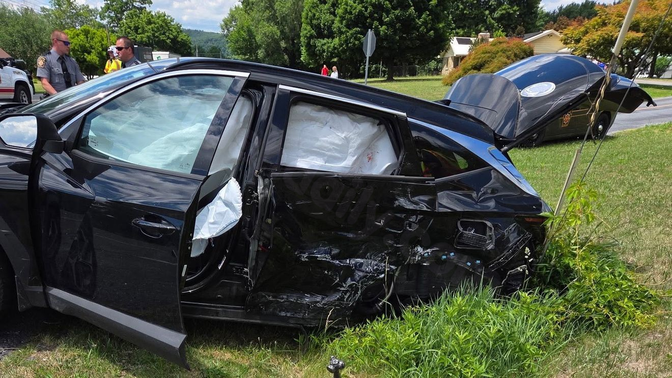 At least 1 hospitalized after crash involving motorcycle