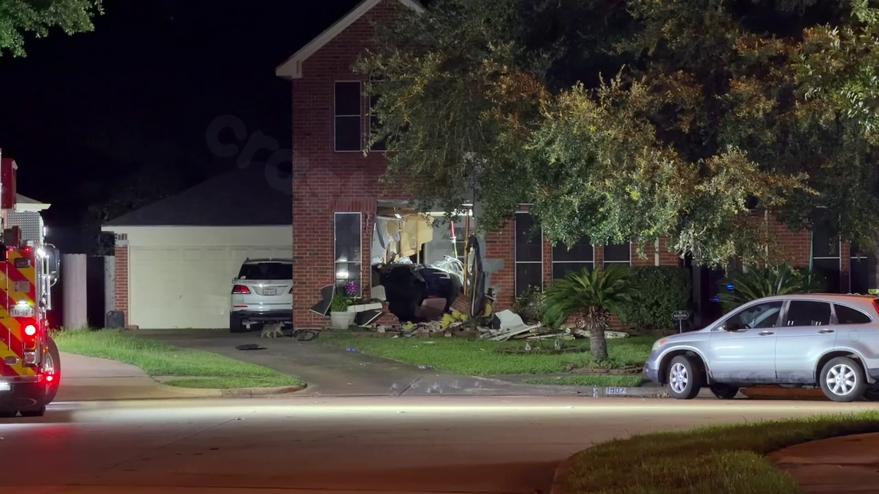 Katy crash: Tesla crashes into house on Rose Hollow Lane, elderly woman killed