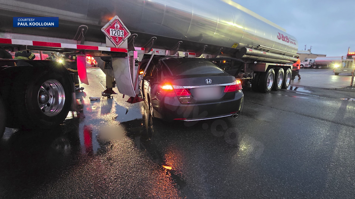 Car trapped under oil tanker after Chelsea crash