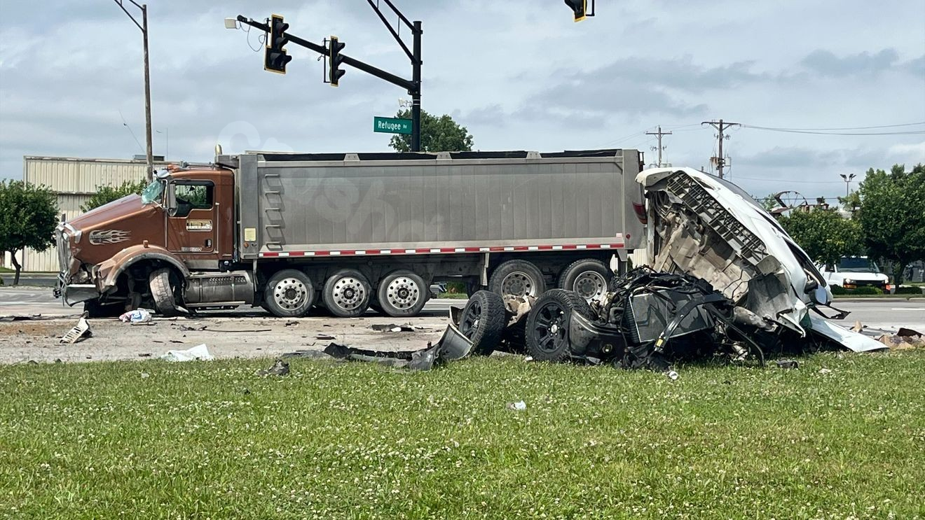 One dead following crash with dump truck, SUV