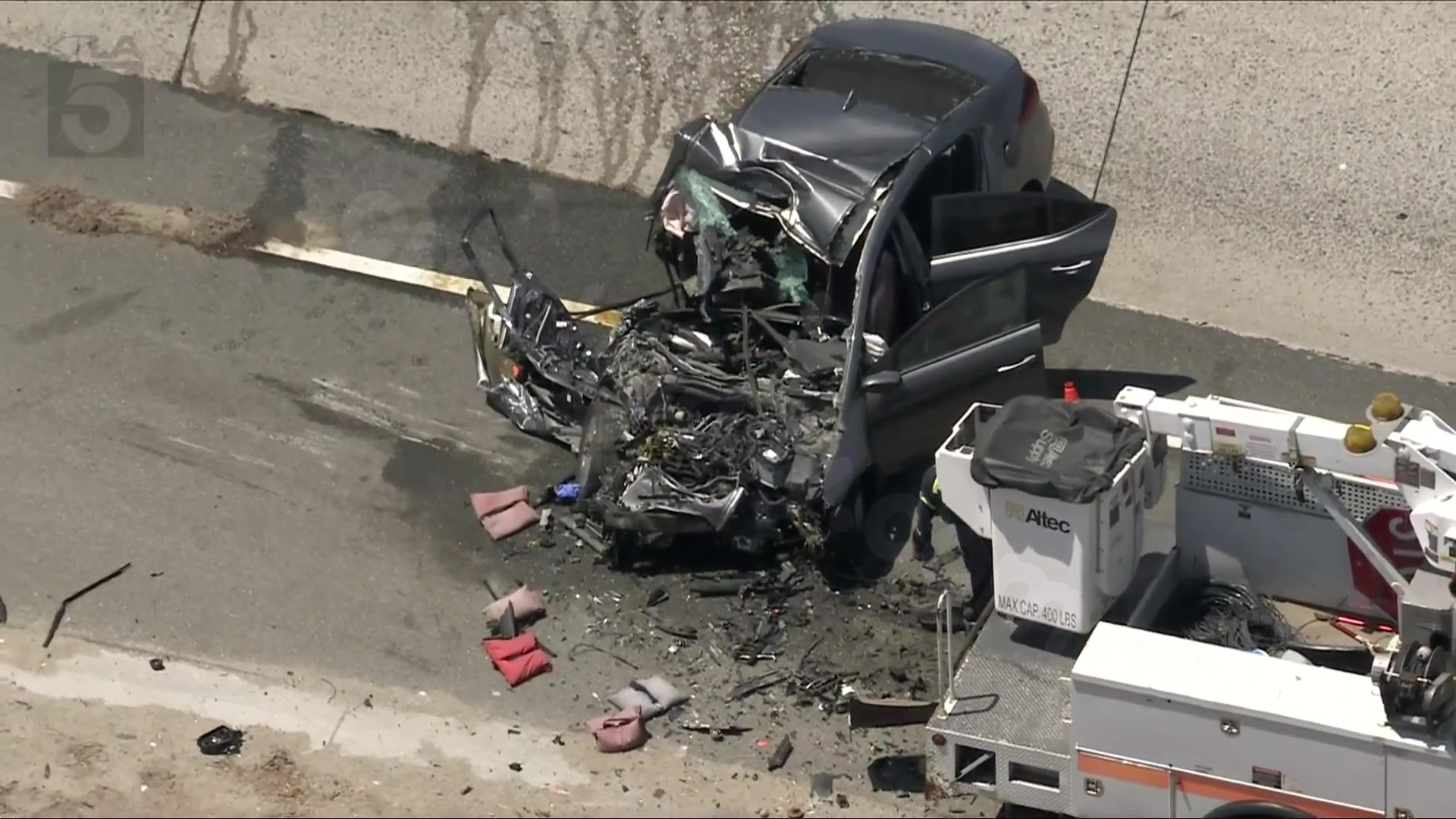 Caltrans workers rescue driver after car crashes into maintenance truck on 5 Freeway