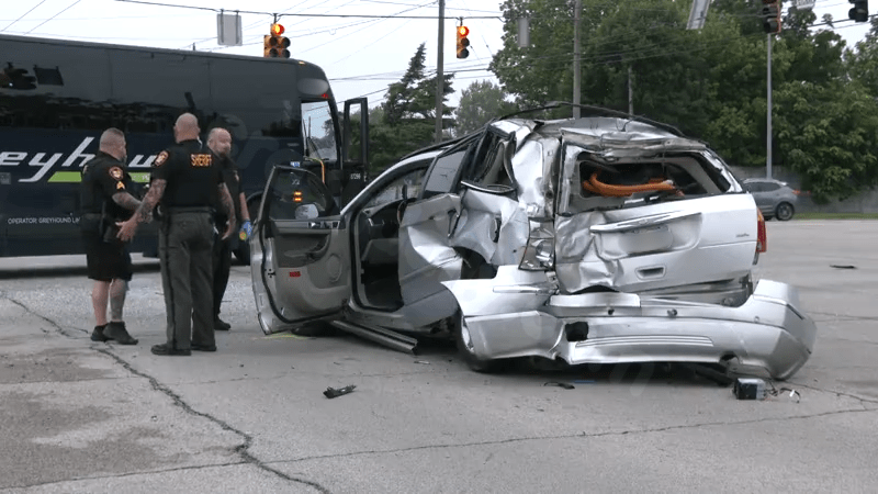 Greyhound bus crashes with disabled vehicle, multiple injured
