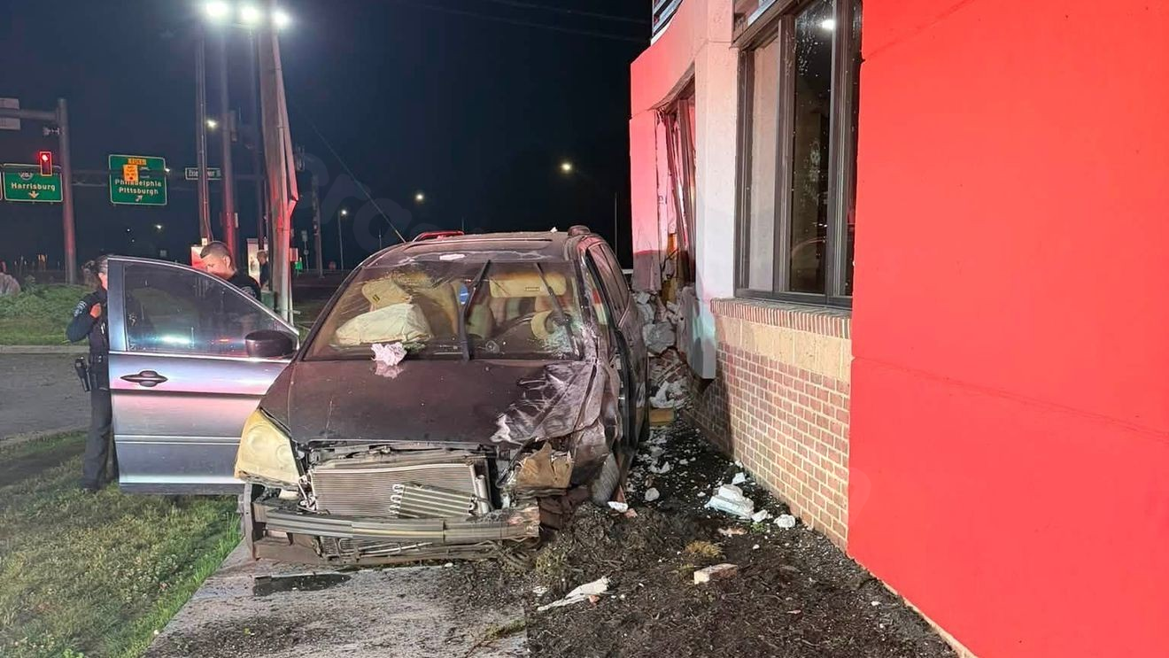 Person extricated from vehicle after crashing into Wendy's